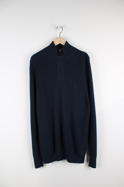 Vintage Burberry Brit navy blue 1/4 zip, cashmere blend knit jumper features signature embroidered logo on the chest and high neck