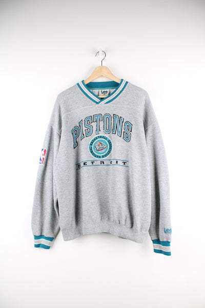 Vintage Detroit Pistons grey v-neck sweatshirt by Lee Sport, features embroidered spell-out details and badge on the front