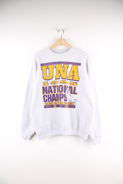 Vintage 1995 University of North Alabama university football grey crewneck sweatshirt by Hanes Activewear. Features printed spell-out text on the front 