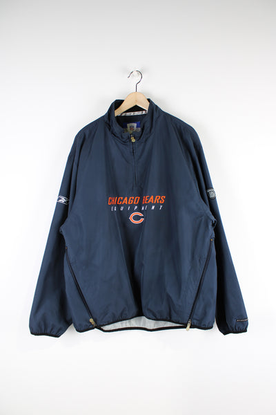 Vintage 00's Reebok Chicago Bears pull over /training top with quarter zip neckline and embroidered team logo on the across the chest. Also features zips down the sides of the torso.  good condition - some faint marks on the back (see photos)  Size in Label:  L