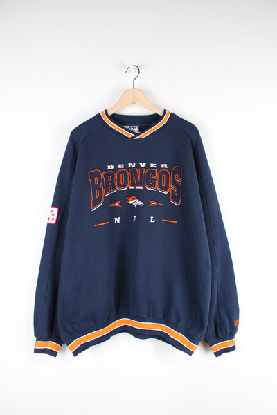 Vintage NFL Denver Broncos navy blue sweatshirt with printed team logo on the front. Made by Lee Sports.  good condition - discoloring to the white embroidery of "Denver" (see photos)  Size in Label: XL