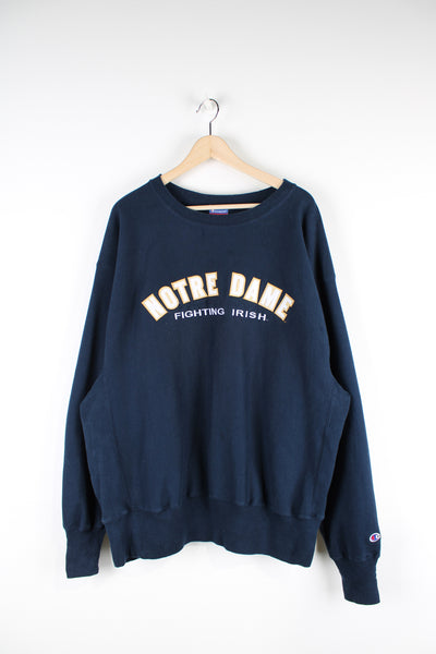 Vintage Notre Dame Fighting Irish navy blue sweatshirt with embroidered team logo on the front. Made by Champion.  good condition  Size in Label: Mens XL 