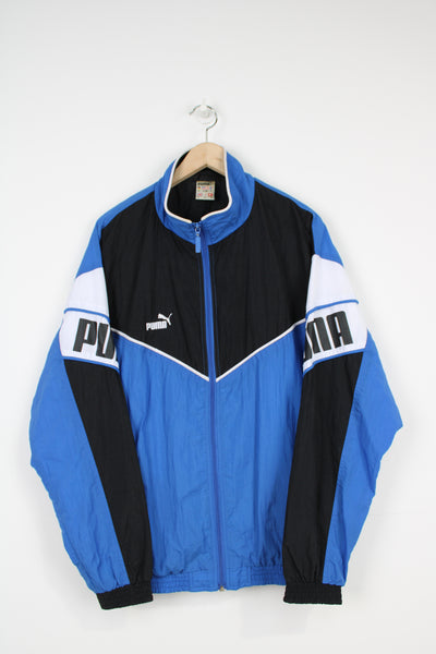 Vintage 90's blue and white Puma zip through track top with spell-out details on the sleeves
