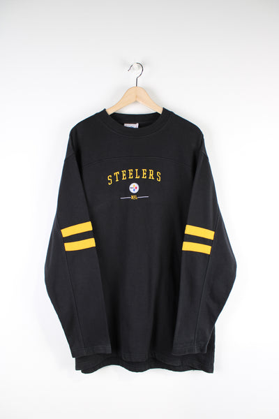 Vintage Pittsburgh Steelers black sweatshirt with embroidered team logo on the chest. Sweatshirt made by Discus Athletics.  good condition  Size in Label:   No Size Label - Measures like a mens L