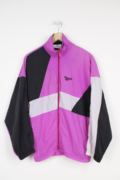 Vintage Reebok purple zip through tracksuit top with embroidered logo on the chest and back