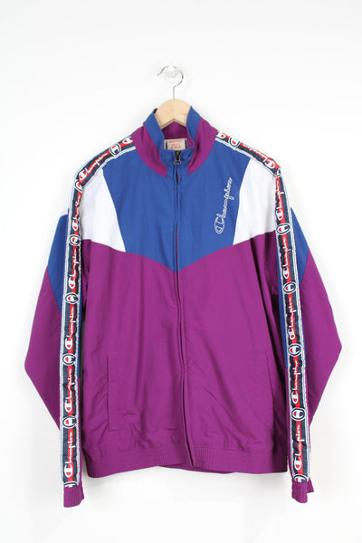 Purple and white vintage Champion zip through tracksuit top with embroidered logo on the chest