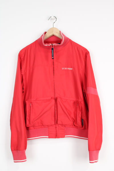 Vintage Le Coq Sportif red zip through tracksuit jacket with embroidered logo on the chest 
