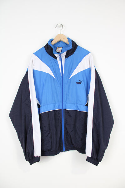 Vintage 90's Puma blue and black zip through tracksuit jacket with embroidered logo on the chest