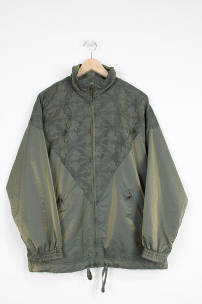 Ellesse metallic green zip through shell jacket with embroidered logo on the pocket