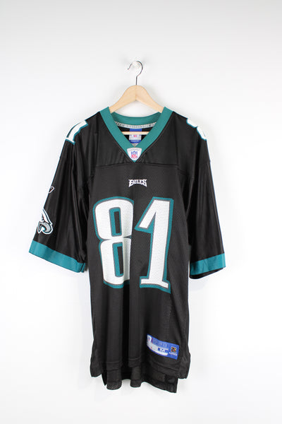 Philadelphia Eagles Terrell Owens number 81 NFL jersey.  Made by Reebok.  good condition - small mark on the 8 on the front (see photos)  Size in Label:  Mens M