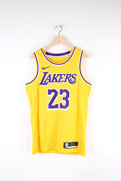 Los Angeles Lakers number 23 LeBron James NBA Jersey made by Swingman.  good condition  Size in Label:  Mens M 44