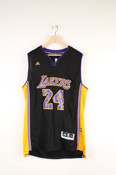 Los Angeles Lakers number 24 Kobe Bryant NBA Jersey. Made by Swingman/ Adidas and features applique letters/ numbers.  good condition  Size in Label:  Mens XL