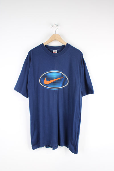 Vintage 90's Nike Centre Swoosh T-shirt, blue, white and orange colourway, short sleeve with a crewneck, and has the swoosh logo printed on the front. 