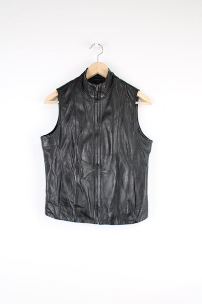 Vintage Y2K Next black real leather waistcoat/ gilet. Closes with a zip and has two front pockets.  good condition