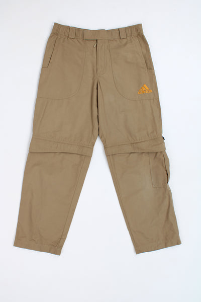 Adidas tan sport trousers with zip off legs and embroidered logo on the pocket
