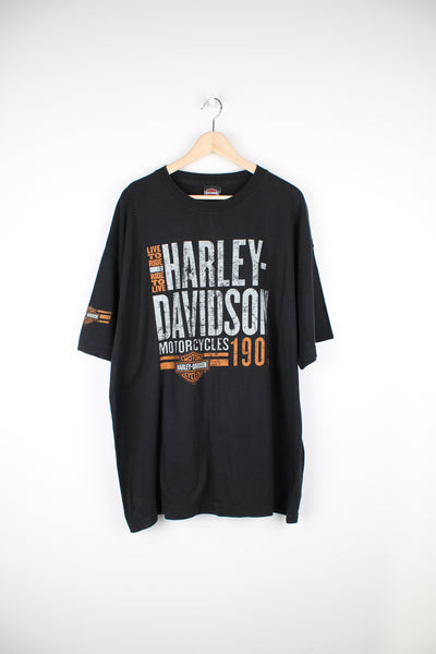 Vintage Harley Davidson Orlando Florida black t-shirt with spell-out graphic on the front and motorcycle on the back