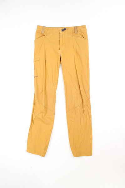 Patagonia women's mustard yellow cotton lightweight walking trousers, features embroidered logo on the let 