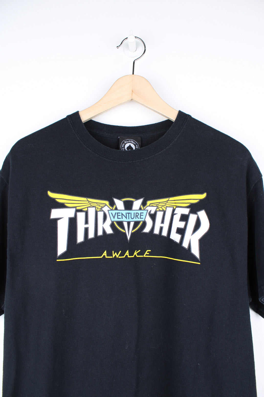 Thrasher X Venture black t-shirt with spell-out logo printed across the chest