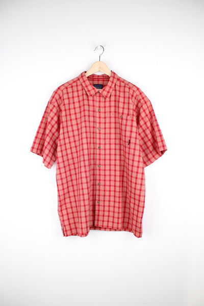 Patagonia rusted red large plaid shirt with signature Patagonia label on the pocket