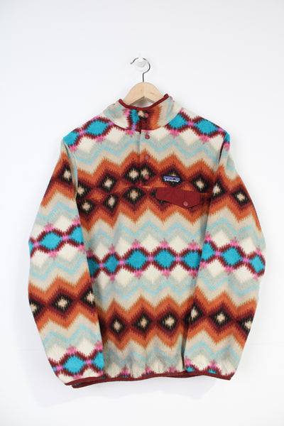 Patagonia Synchilla pattern fleece with 1/4 popper fastening and chest pocket