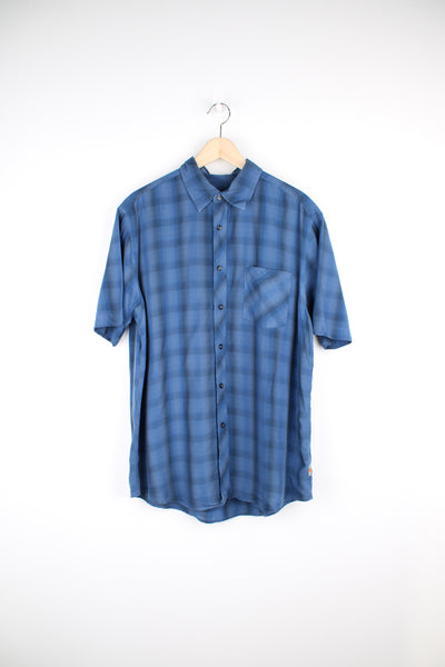 Quiksilver dark blue plaid button up shirt features chest pocket and embroidered logo on the back of the shoulder