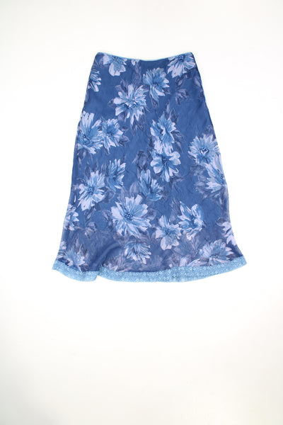 Vintage Y2K blue and purple floral print midi skirt. Could be worn mid or low rise depending on measurements.  good condition  Size in label:   Womens M