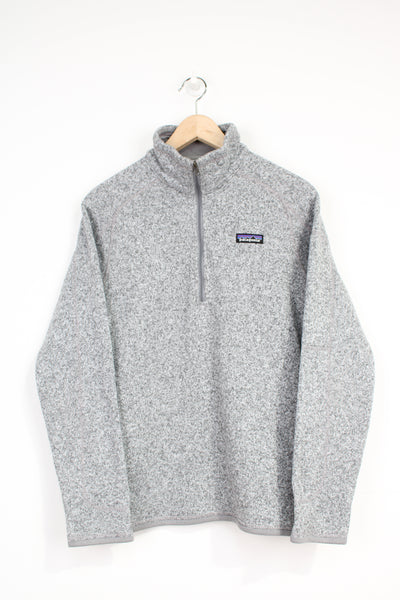 Patagonia grey knitted 1/4 zip fleece with embroidered logo on the chest and zip up pocket on the sleeve