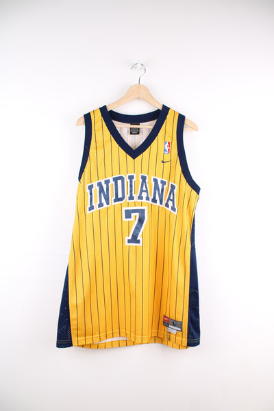 Jermaine O'Neal #7 for the Indiana Pacers NBA jersey in yellow by Nike, features embroidered spell-out on the front and back