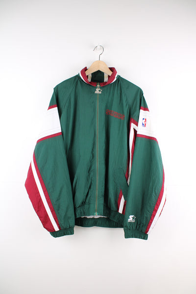 Seattle Supersonics green lightweight windbreaker style jacket by Starter, features embroidered spell-out logo on the chest and large embroidered motif on the back