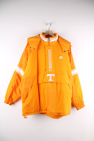 Vintage Starter NCAA Tennessee volunteers 1/4 zip, hooded puffer jacket/coat in orange features embroidered spell-out details on the front and back 
