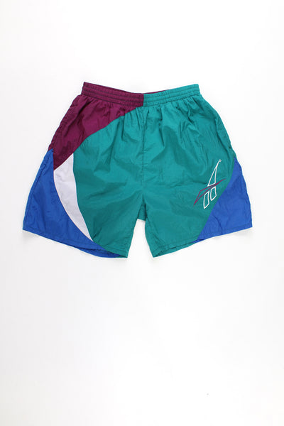 Vintage Reebok green, purple and blue swim shorts with elasticated waist and drawstring, features embroidered logo on the leg