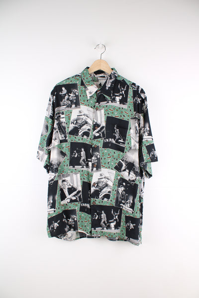 Vintage 90's Reyn Spooner, Elvis Presley Shirt in a green, black and white colourway, concert photos printed all over, button up and has a chest pocket.