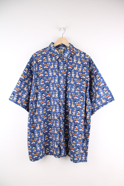Vintage Mickey Mouse Disney Shirt in a blue colourway, cartoon print all over, button up and has a chest pocket.