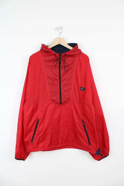 Helly Hansen red 1/4 zip windbreaker jacket with embroidered logo on the chest
