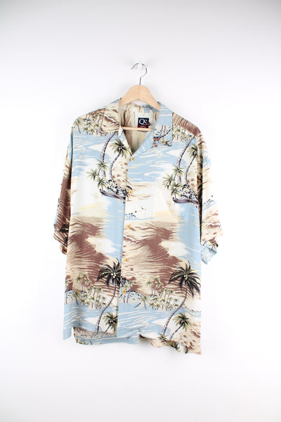 Quiksilver Hawaiian Shirt in a blue and tanned colourway, island style print all over, button up with camp collar and has a chest pocket.