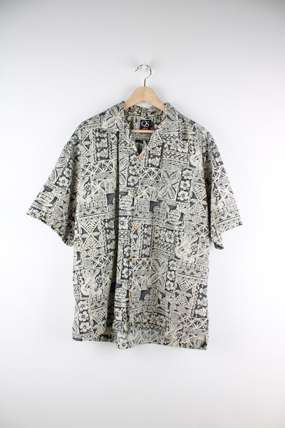 Quiksilver Hawaiian Shirt in a tan and black colourway, floral design printed all over, button up with a camp collar and has a chest pocket.