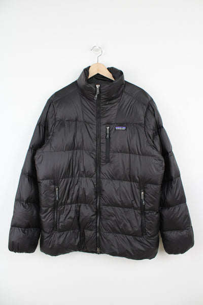 Vintage Patagonia all black, zip through puffer jacket with embroidered logo on the chest