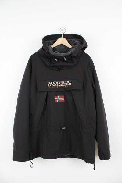 Napapijri black, fleece lined pullover jacket with embroidered badges on the front and sleeve