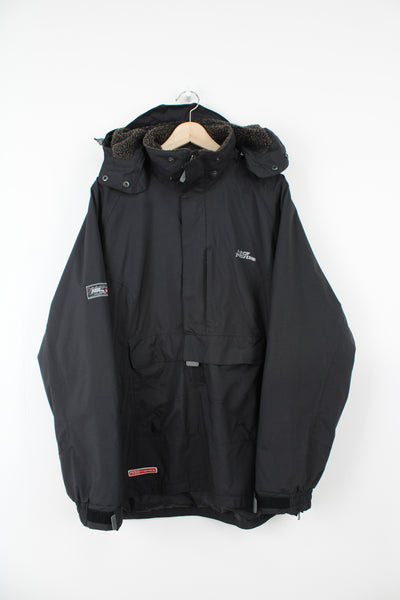 No Fear all black,  pullover outdoor jacket. Features embroidered logo on the chest and arm, comes with detachable hood.