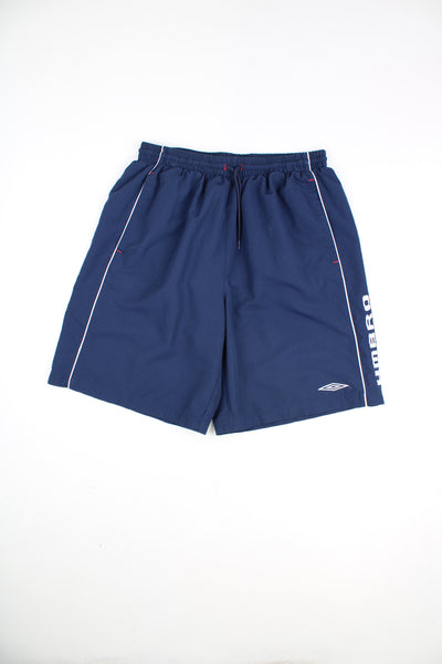 Umbro Shorts in a blue and white colourway, adjustable waist, pockets, and has the logo embroidered on the front and left side.