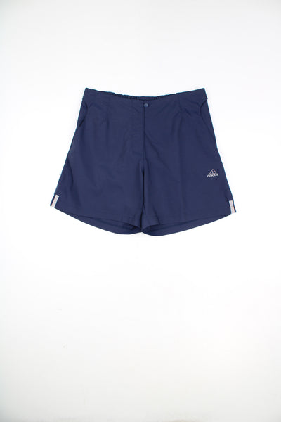 Adidas Shorts in a blue colourway, adjustable waist, pockets, and has the logo embroidered on the front.
