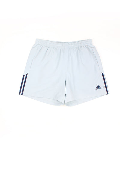 Adidas Shorts in a pale blue colourway, adjustable waist, cotton netted lining, pockets and has the logo embroidered on the front.