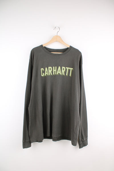Carhartt khaki green relaxed fit long sleeve top with spell-out logo across the chest