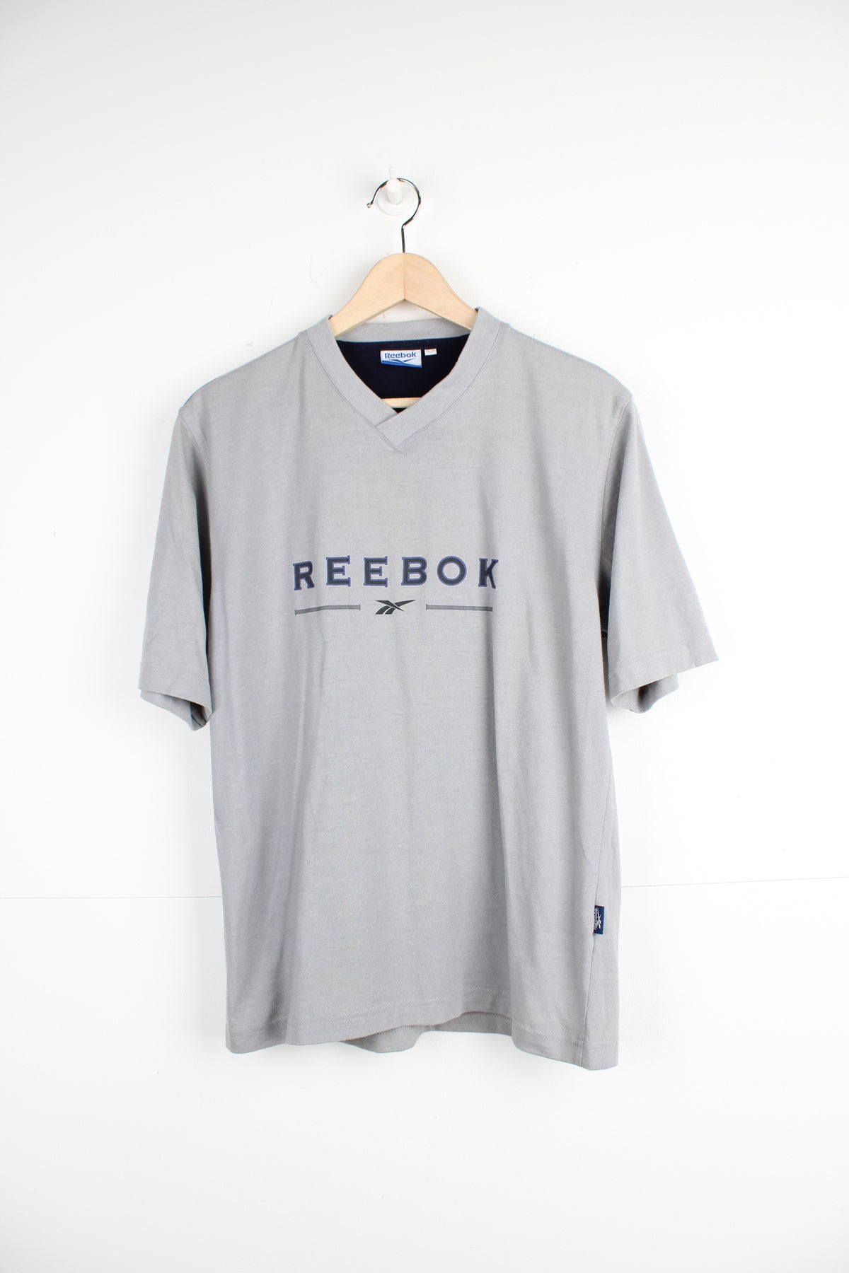Reebok v neck t shirts deals