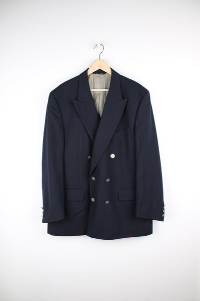 Vintage Burberry navy blue double breasted blazer. Features silver metal buttons with the Burberry logo.  good condition - the lining has some small marks near the hem and one small hole in the lining. There is also wear to the metal buttons.   Size on Label:  No Size - please see measurements below, Measures like a Mens L