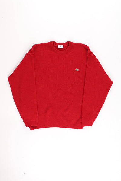 Vintage Lacoste red crew neck knit jumper with embroidered crocodile logo on the chest.