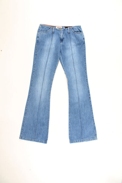 Diesel mid rise flared jeans with multiple pockets, pin tucked, and logo embroidered on the back.