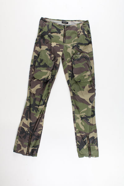 Miss Sixty Camo Cargo Trousers in a green, black and brown colourway, multiple utility style pockets, and has the logo embroidered on the back pocket.