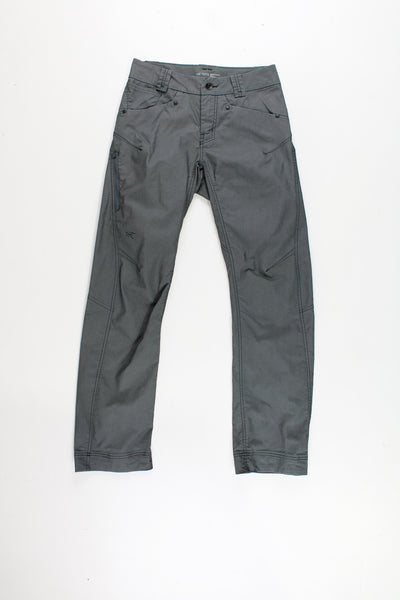 Arcteryx grey slim leg tech trousers with multiple pockets and reflective accents 
