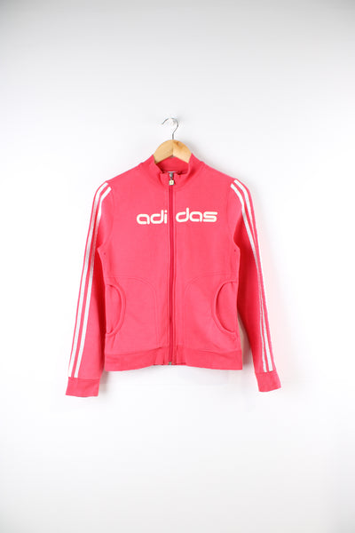 2000's Adidas pink zip through cotton track jacket with spell-out glittery details across the chest and kangaroo pockets.